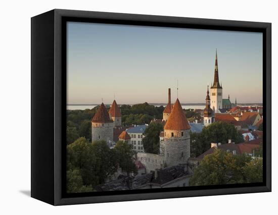 Medieval Town Walls and Spire of St. Olavs Church at Dusk, Tallinn, Estonia, Baltic States, Europe-Neale Clarke-Framed Premier Image Canvas