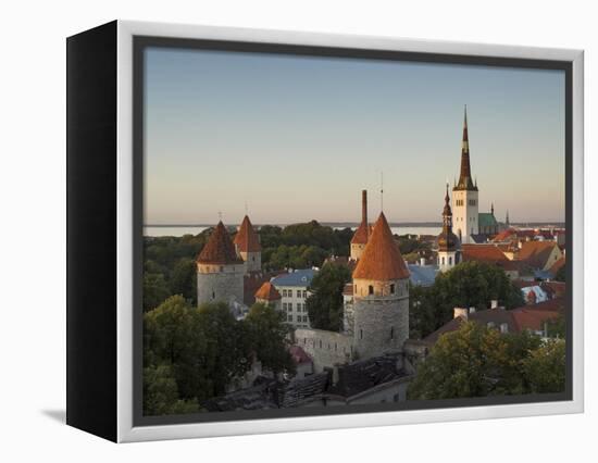 Medieval Town Walls and Spire of St. Olavs Church at Dusk, Tallinn, Estonia, Baltic States, Europe-Neale Clarke-Framed Premier Image Canvas