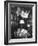 Member Reading Newspaper in Smoking Room at the Harvard Club Beneath a Rhino Head Trophy-Alfred Eisenstaedt-Framed Photographic Print