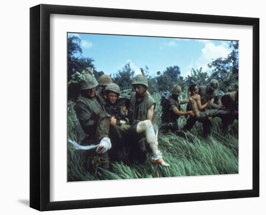 Members of 1st Marine Division Carrying Wounded During Firefight During Vietnam War. South Vietnam-Larry Burrows-Framed Photographic Print