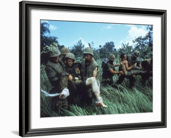 Members of 1st Marine Division Carrying Wounded During Firefight During Vietnam War. South Vietnam-Larry Burrows-Framed Photographic Print