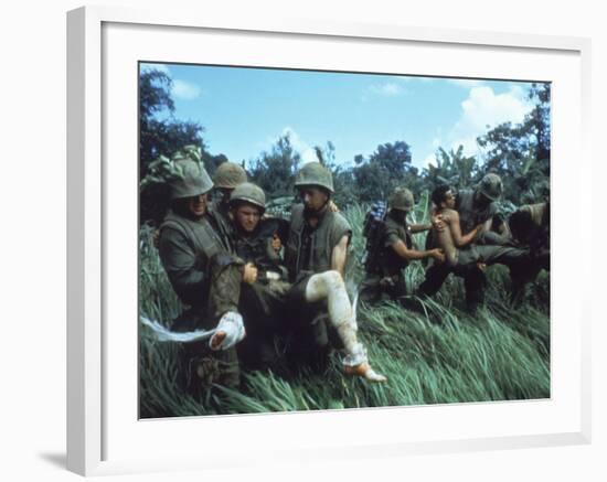 Members of 1st Marine Division Carrying Wounded During Firefight During Vietnam War. South Vietnam-Larry Burrows-Framed Photographic Print