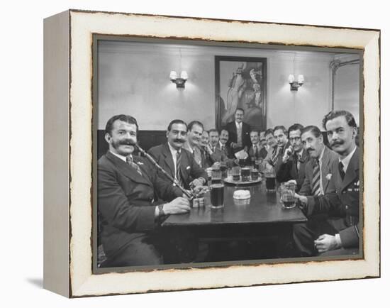 Members of Handlebar Club Sitting at Table and Having Formal Beer Session-Nat Farbman-Framed Premier Image Canvas
