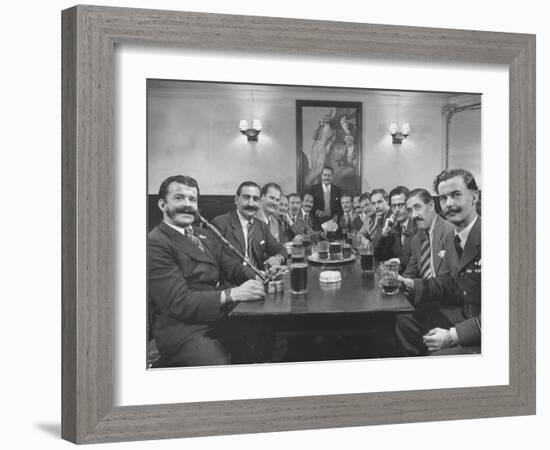 Members of Handlebar Club Sitting at Table and Having Formal Beer Session-Nat Farbman-Framed Photographic Print