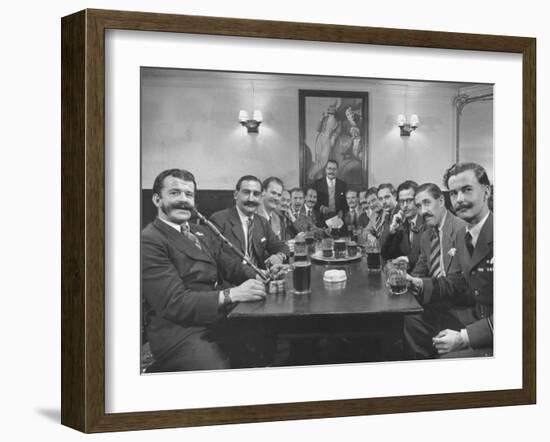 Members of Handlebar Club Sitting at Table and Having Formal Beer Session-Nat Farbman-Framed Photographic Print