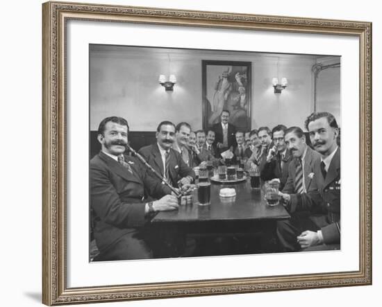 Members of Handlebar Club Sitting at Table and Having Formal Beer Session-Nat Farbman-Framed Photographic Print