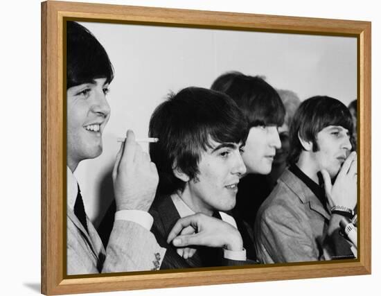 Members of the Beatles During an Interview at Los Angeles International Airport-Bill Ray-Framed Premier Image Canvas