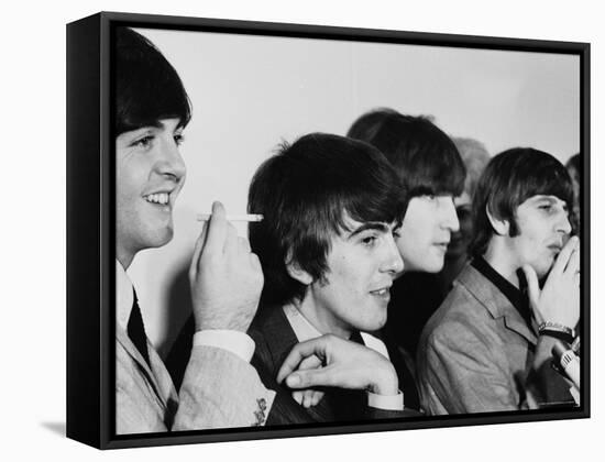 Members of the Beatles During an Interview at Los Angeles International Airport-Bill Ray-Framed Premier Image Canvas