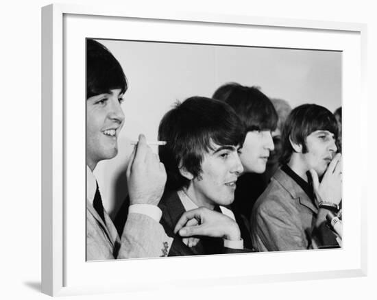 Members of the Beatles During an Interview at Los Angeles International Airport-Bill Ray-Framed Premium Photographic Print