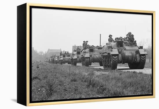 Members of the British 49th Armoured Personnel Carrier Regiment Riding Along a Line of Tanks-George Silk-Framed Premier Image Canvas