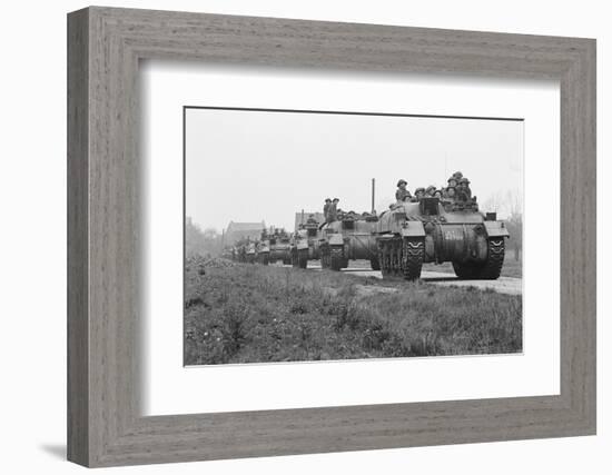 Members of the British 49th Armoured Personnel Carrier Regiment Riding Along a Line of Tanks-George Silk-Framed Photographic Print