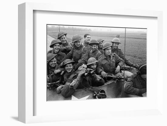 Members of the British 49th Armoured Personnel Carrier Regiment Riding Along a Line of Tanks-George Silk-Framed Photographic Print