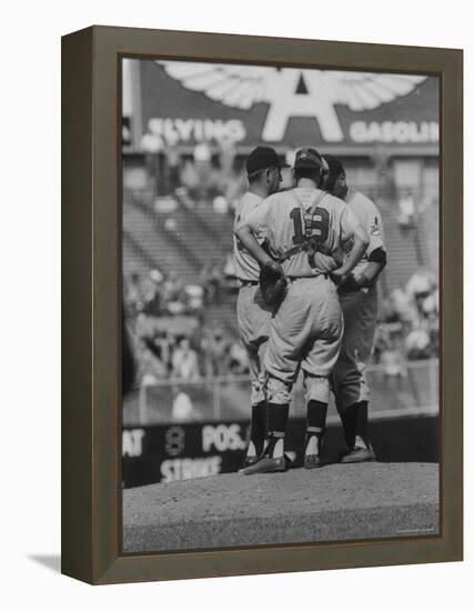 Members of the Cleveland Indians Conferring on the Mound During a Game-Yale Joel-Framed Premier Image Canvas