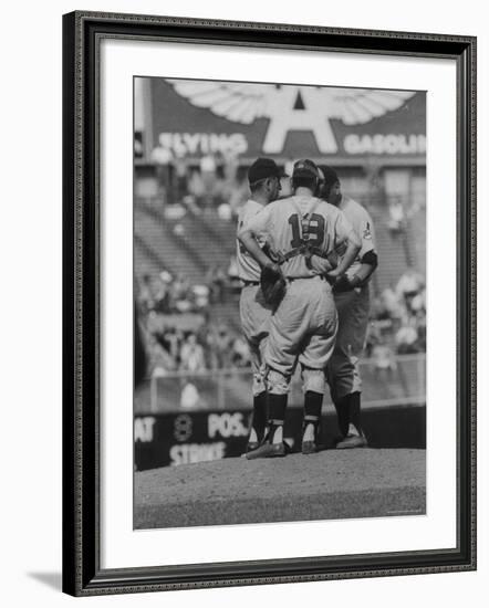 Members of the Cleveland Indians Conferring on the Mound During a Game-Yale Joel-Framed Premium Photographic Print