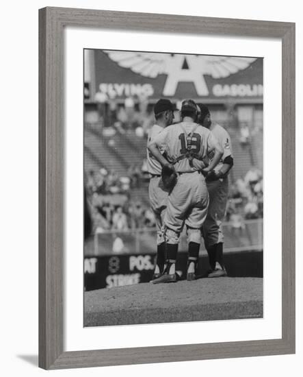 Members of the Cleveland Indians Conferring on the Mound During a Game-Yale Joel-Framed Premium Photographic Print