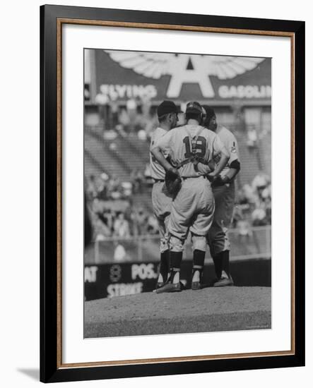 Members of the Cleveland Indians Conferring on the Mound During a Game-Yale Joel-Framed Premium Photographic Print