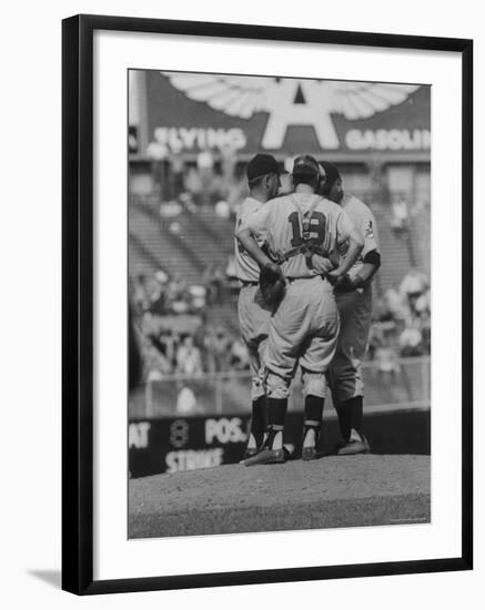 Members of the Cleveland Indians Conferring on the Mound During a Game-Yale Joel-Framed Premium Photographic Print