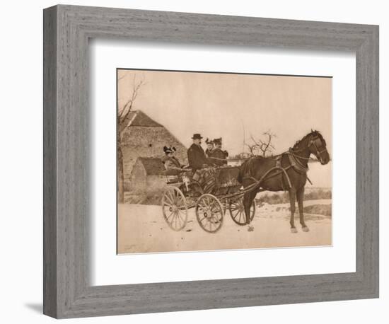 'Men and women in a horse-drawn carriage', 1937-Louis Guichard-Framed Photographic Print