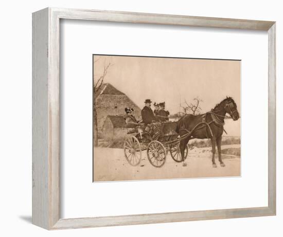 'Men and women in a horse-drawn carriage', 1937-Louis Guichard-Framed Photographic Print