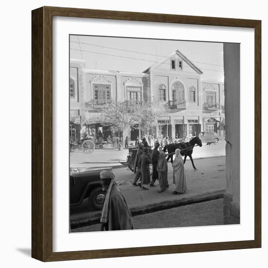 Men and Women, Wearing the Traditional Burqa, Walk Along a Street in Kabul-null-Framed Photographic Print