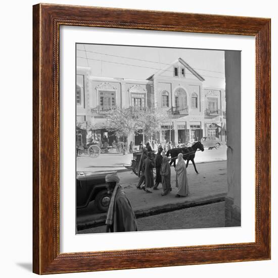 Men and Women, Wearing the Traditional Burqa, Walk Along a Street in Kabul-null-Framed Photographic Print