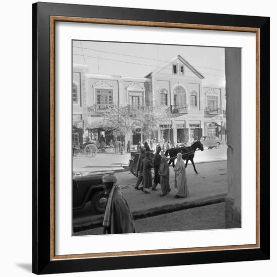 Men and Women, Wearing the Traditional Burqa, Walk Along a Street in Kabul-null-Framed Photographic Print