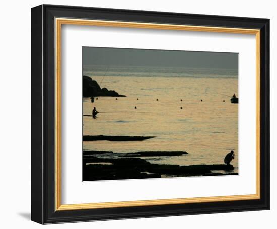 Men are Silhouetted Against the Sea as They Fish and Relax on the Beirut Coastline, August 24, 2006-Matt Dunham-Framed Photographic Print