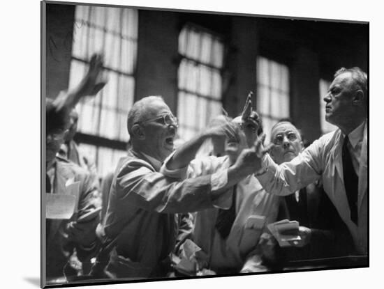 Men Arguing over Stock Exchanges-Ralph Morse-Mounted Photographic Print