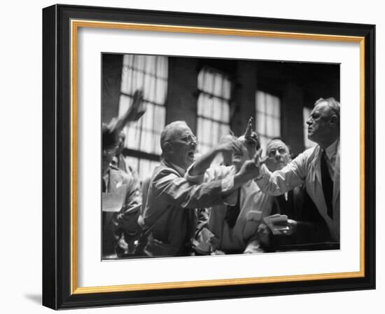 Men Arguing over Stock Exchanges-Ralph Morse-Framed Photographic Print