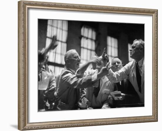 Men Arguing over Stock Exchanges-Ralph Morse-Framed Photographic Print