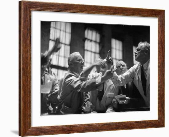 Men Arguing over Stock Exchanges-Ralph Morse-Framed Photographic Print