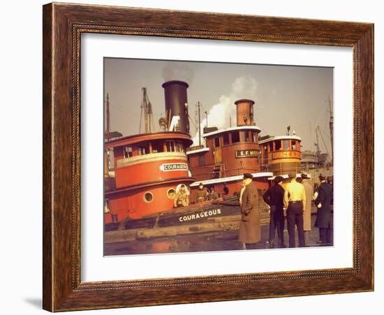Men at pier looking at 3 Tugboats, One Named "Courageous" with Crewmen on Deck-Andreas Feininger-Framed Photographic Print