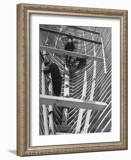 Men Building Ship Out of Wood-Dmitri Kessel-Framed Photographic Print