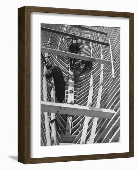 Men Building Ship Out of Wood-Dmitri Kessel-Framed Photographic Print