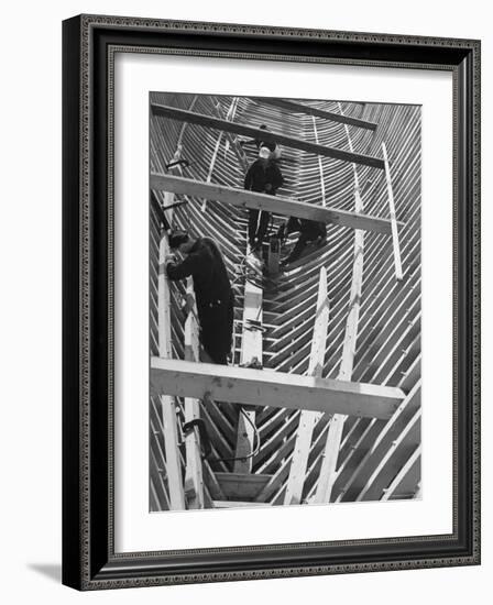 Men Building Ship Out of Wood-Dmitri Kessel-Framed Photographic Print