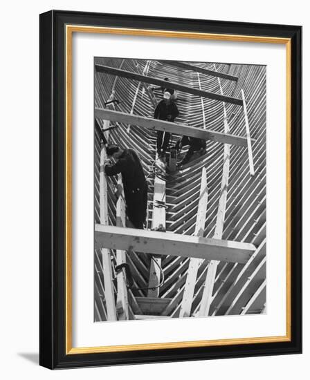 Men Building Ship Out of Wood-Dmitri Kessel-Framed Photographic Print