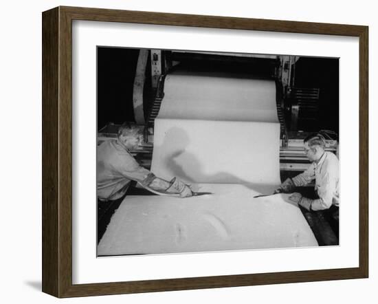 Men Cutting Sheet of Newly Manufactured Rubber-null-Framed Photographic Print