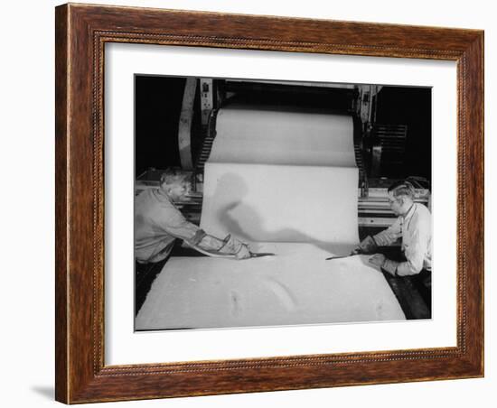 Men Cutting Sheet of Newly Manufactured Rubber-null-Framed Photographic Print