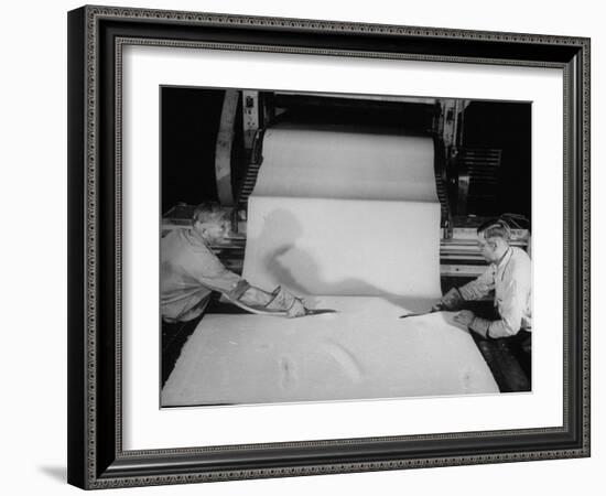 Men Cutting Sheet of Newly Manufactured Rubber-null-Framed Photographic Print