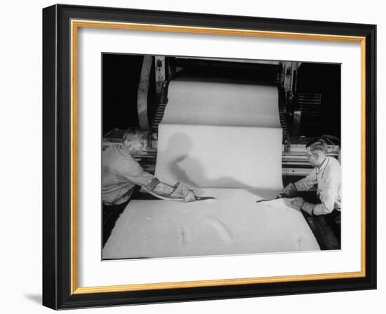 Men Cutting Sheet of Newly Manufactured Rubber-null-Framed Photographic Print