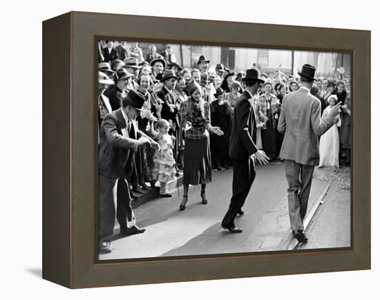 Men dancing in the street as revelers celebrate New Orleans Mardi Gras. February 1938-William Vandivert-Framed Premier Image Canvas