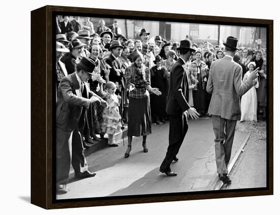 Men dancing in the street as revelers celebrate New Orleans Mardi Gras. February 1938-William Vandivert-Framed Premier Image Canvas