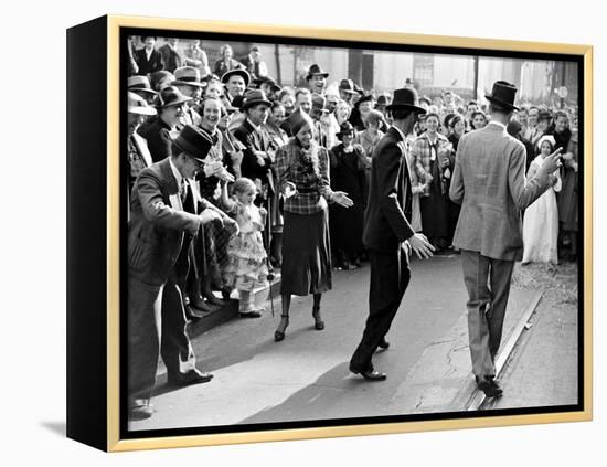 Men dancing in the street as revelers celebrate New Orleans Mardi Gras. February 1938-William Vandivert-Framed Premier Image Canvas