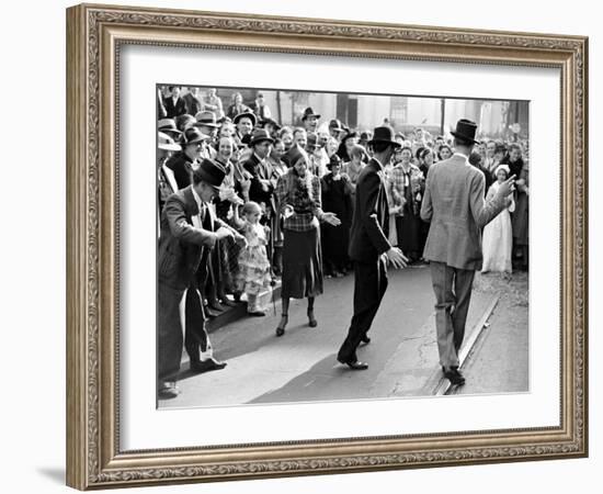 Men dancing in the street as revelers celebrate New Orleans Mardi Gras. February 1938-William Vandivert-Framed Premium Photographic Print