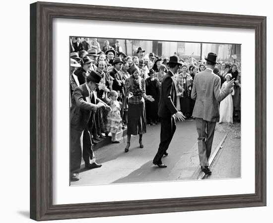 Men dancing in the street as revelers celebrate New Orleans Mardi Gras. February 1938-William Vandivert-Framed Premium Photographic Print