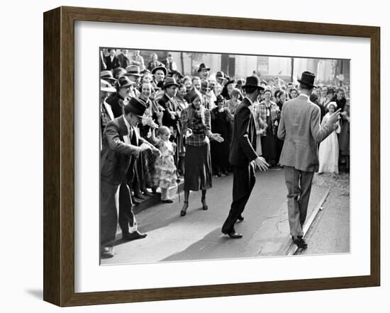 Men dancing in the street as revelers celebrate New Orleans Mardi Gras. February 1938-William Vandivert-Framed Premium Photographic Print