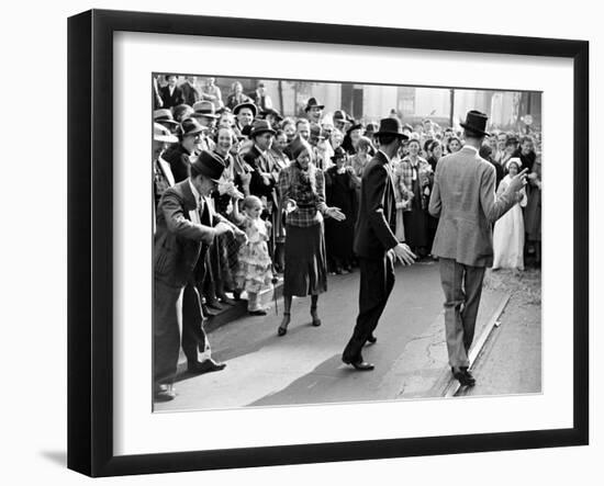 Men dancing in the street as revelers celebrate New Orleans Mardi Gras. February 1938-William Vandivert-Framed Premium Photographic Print