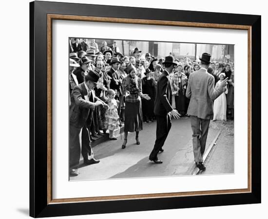 Men dancing in the street as revelers celebrate New Orleans Mardi Gras. February 1938-William Vandivert-Framed Premium Photographic Print