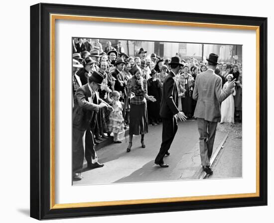 Men dancing in the street as revelers celebrate New Orleans Mardi Gras. February 1938-William Vandivert-Framed Premium Photographic Print