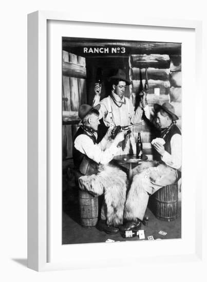 Men Dressed as Cowboys with Bottles of Whiskey, Pistols-Lantern Press-Framed Art Print